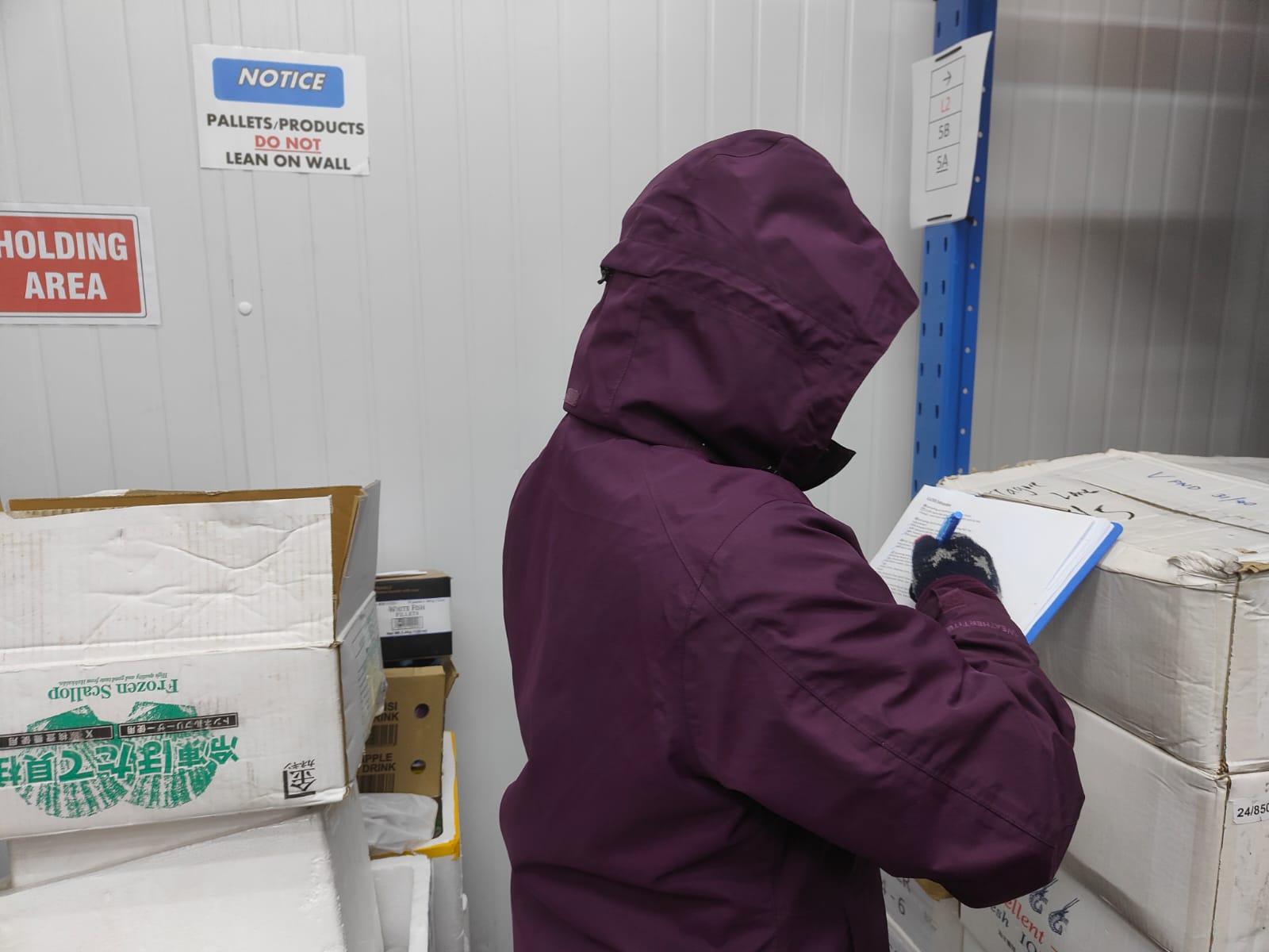worker-recording-temperature