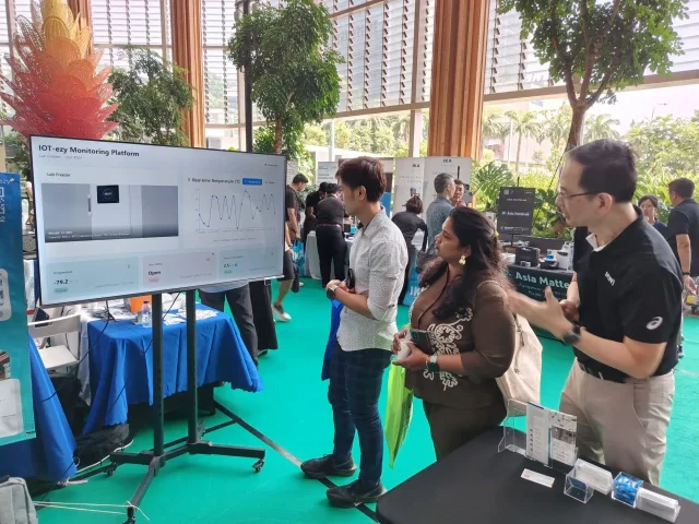 iotezy team interacting with visitors
